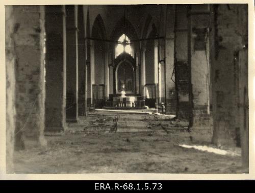 Internal view of the Niguliste Church damaged during the 9th March bombing