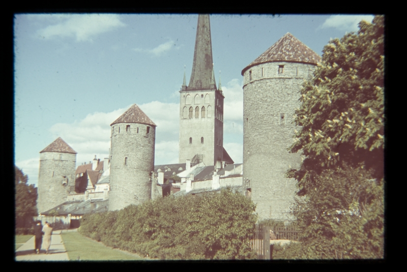 Tower square towards the church of Oleviste. Three city wall towers, the tower of the Oleviste Church.