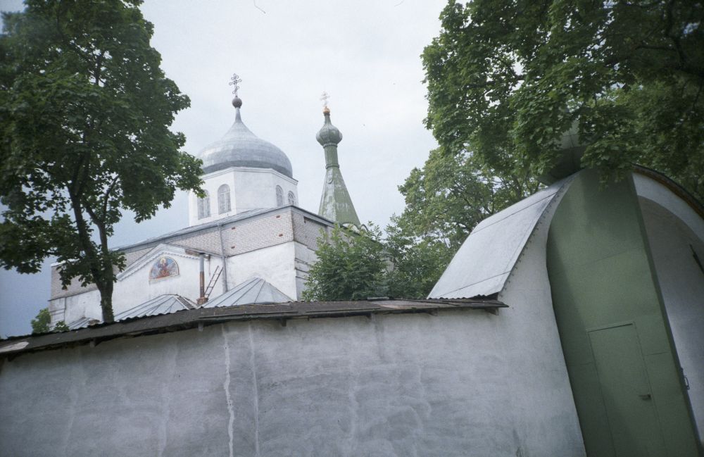 The Orthodox Church and the church wall of the Prophet of Vascan Raspberry