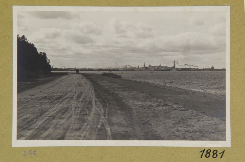 View of Tallinn's panoramics, the road and the sea at the forefront.
