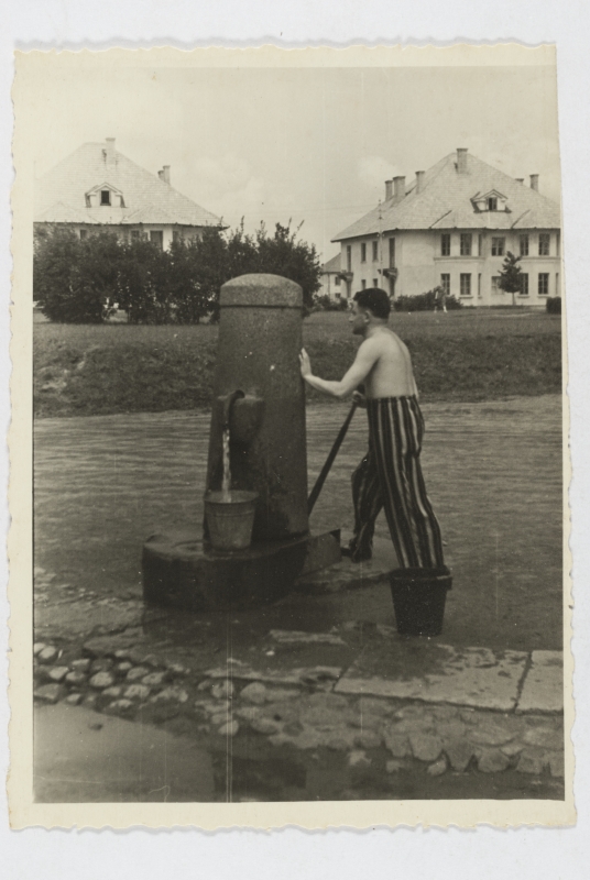 Man from the mine pumping water
