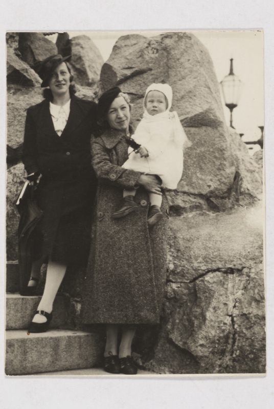Two women with a child at the Russalka monument, 1937