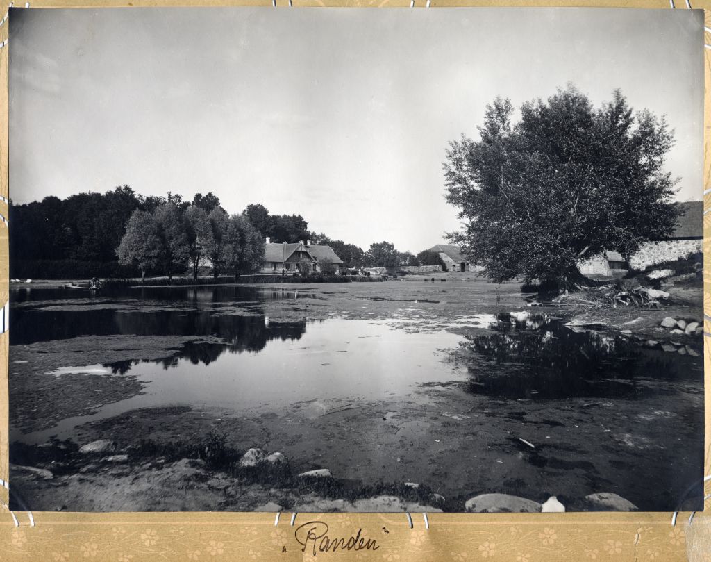 View of the buildings of the Rannu Manor, at the forefront of the water body