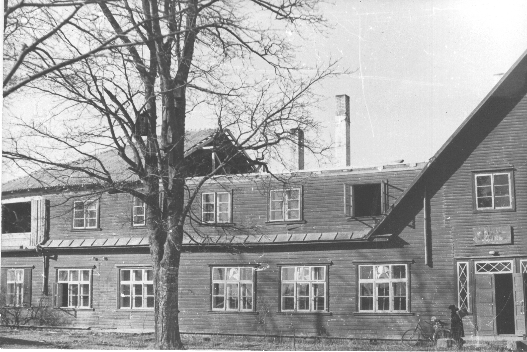 Photo and negative.Repair works of the schoolhouse in 1961.