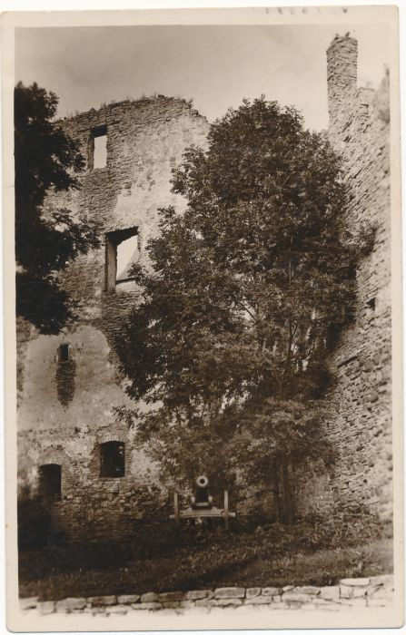 Photo postcard. Haapsalu Castle with a cannon in the courtyard. 1929.