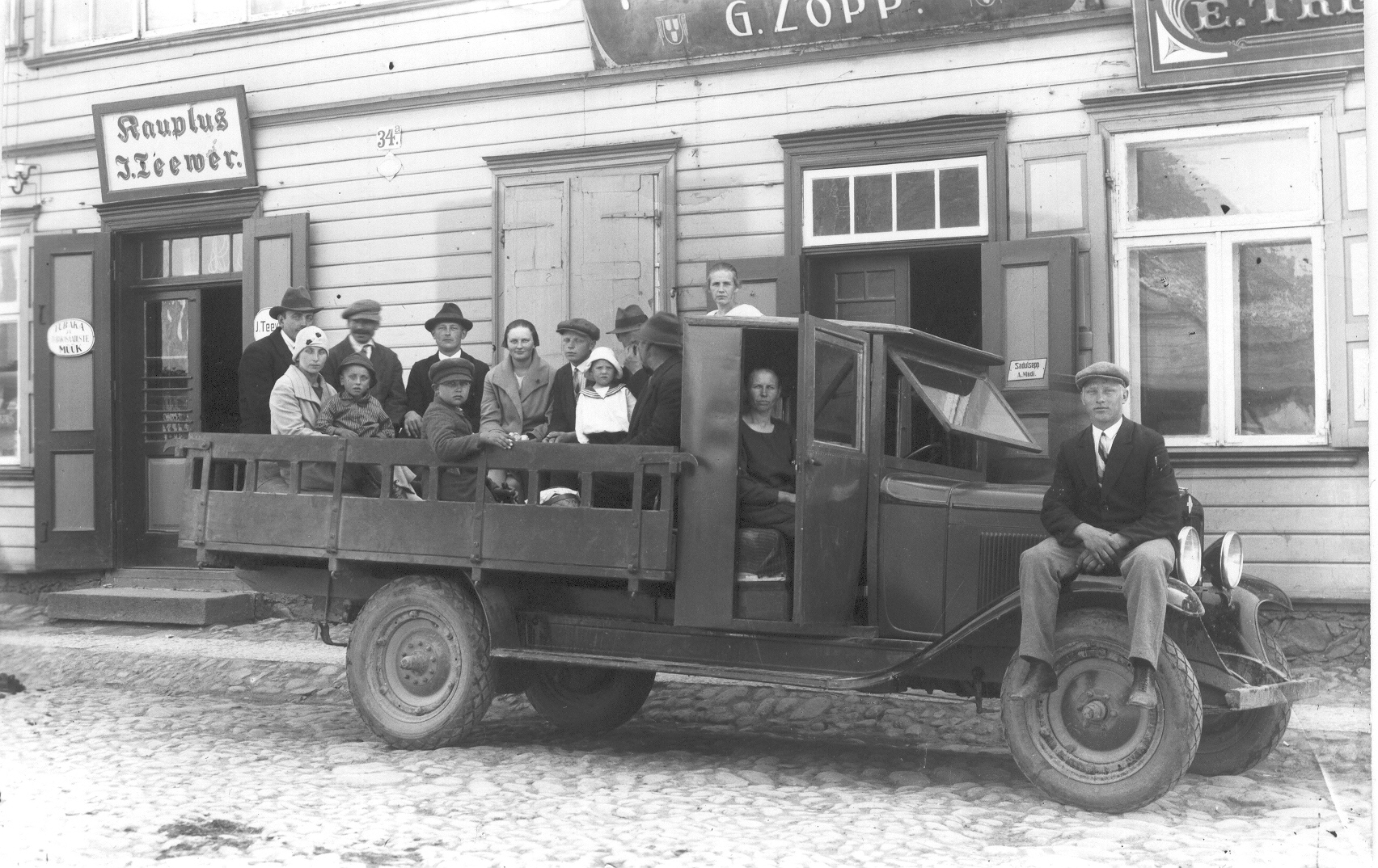 Photo. Truck with passengers.