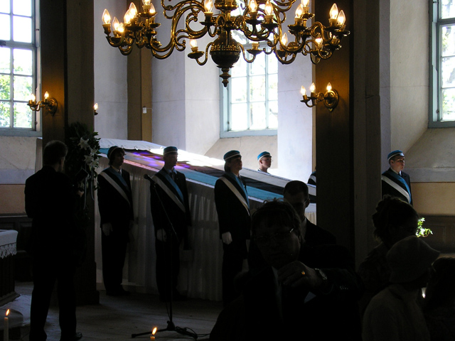 Estonian flag 120. Historical blue-black-white displayed in Otepää church