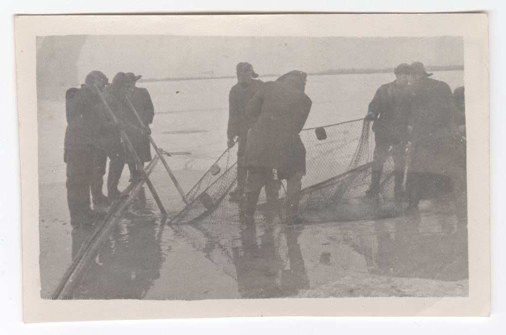 Lovely fishermen in winter fishing