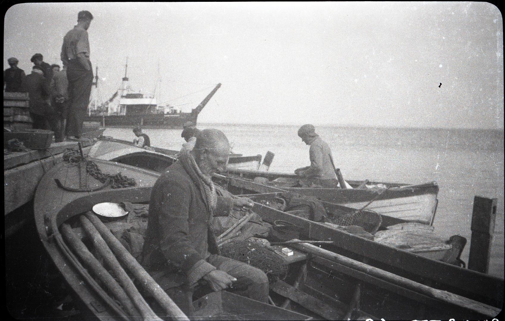 Saaremaa, fishermen with boats in the port of Romassaare