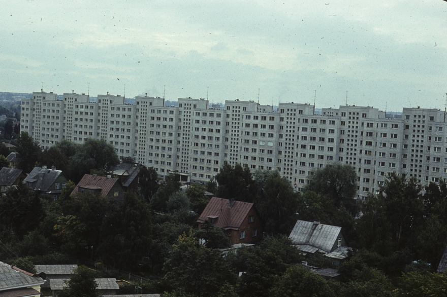 Lilleküla, view over private houses to a long panel lamp