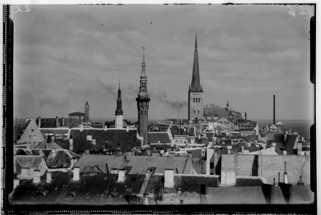 The roofs of the Old Town of Tallinn, the church of Oleviste and the Holy Spirit and the towers of the Raekoja