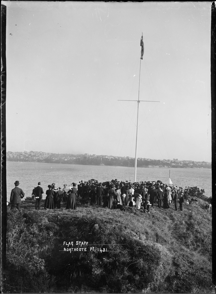 Crowd gathered round the flagstaff at Northcote, Auckland