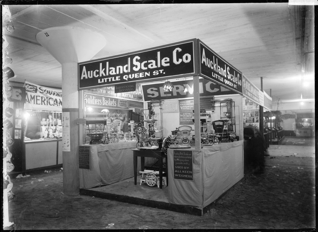 A stand at a trade fair in 1930, advertising the Auckland Scale Company, Little Queen Street