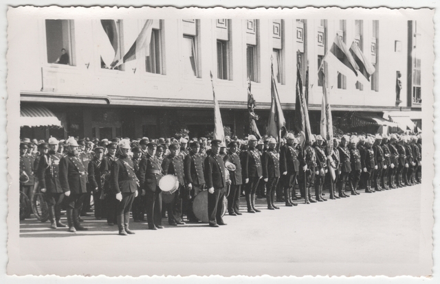 Firefighter row with orchestra and flags on fire parade. Tartu Brigade in 1937.