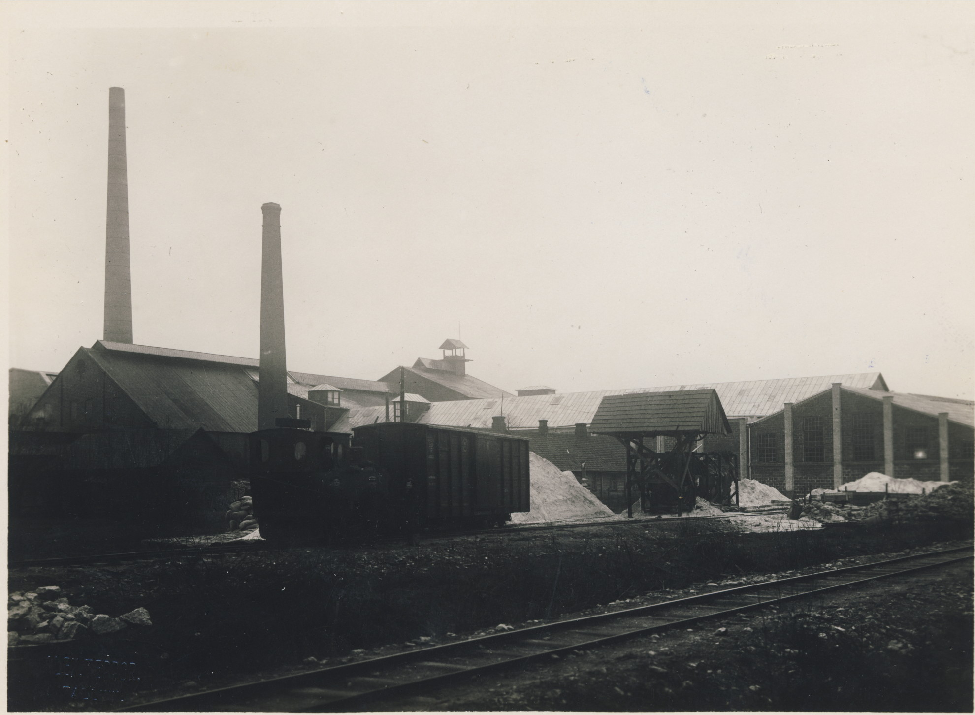 Photo. Järvakandi Glass Factory. Old stone building. Railway. Train