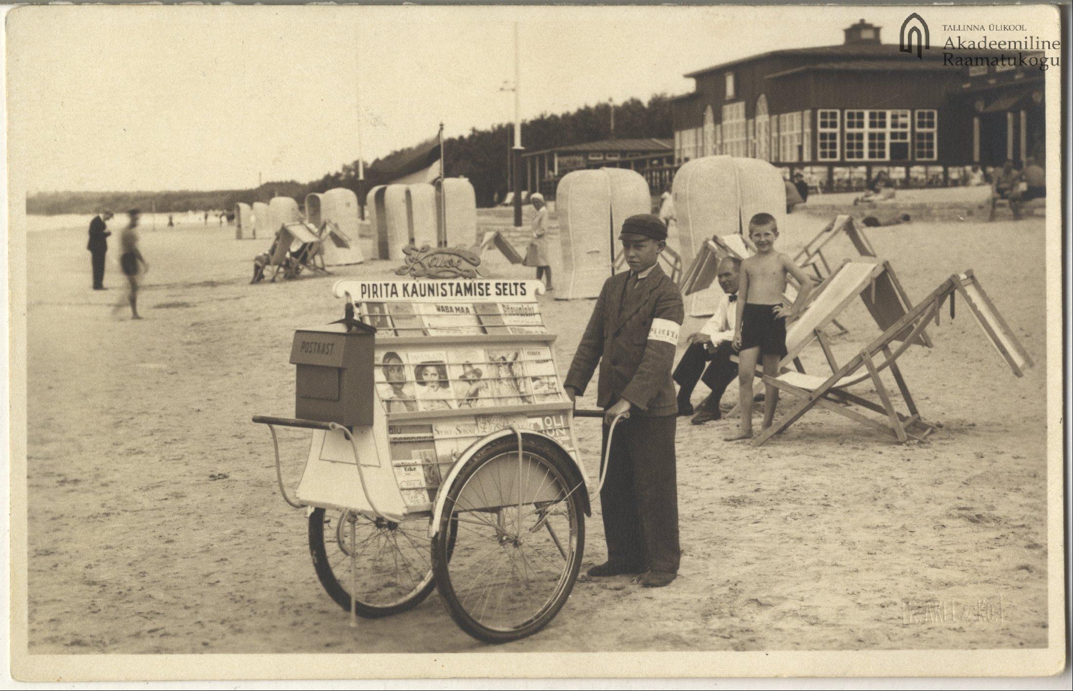 Tallinn. Newspaper boy at the beach of Pirita