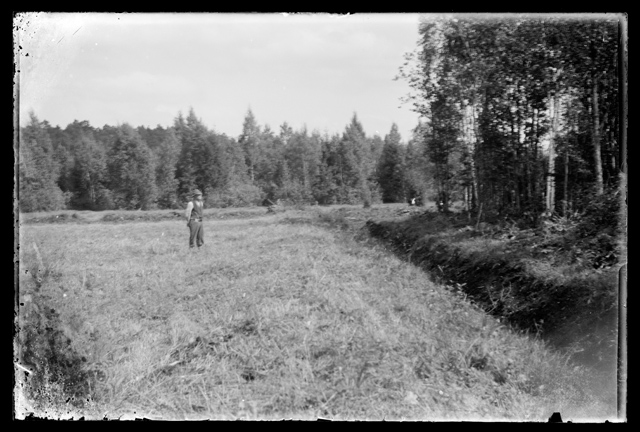 A farmer in the heinland near the forest