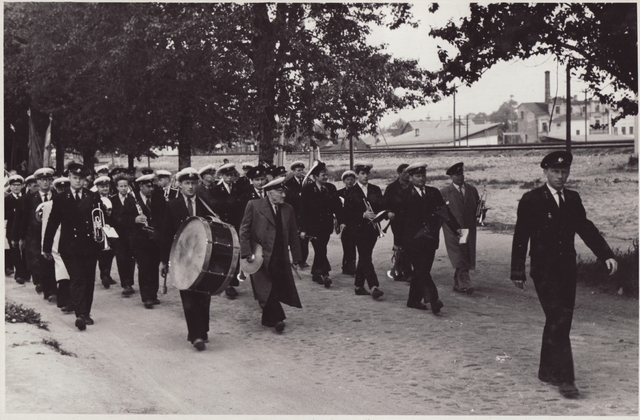 Tartu VTÜ orchestra marching for fire fighting in South Estonia at the Tamme Stadium in 1962.