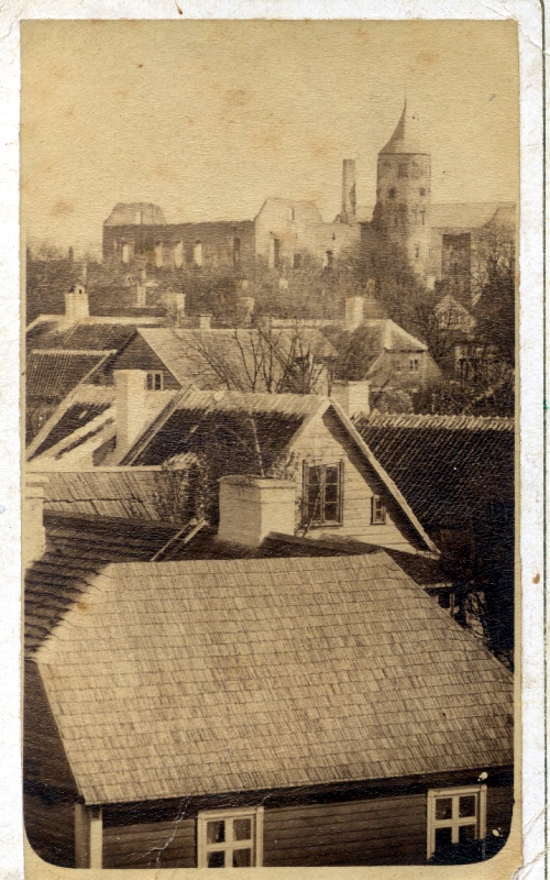 Photo. View of the Haapsalu castle roofs over the northeast of the roofs of the houses. Photos about. 1910.