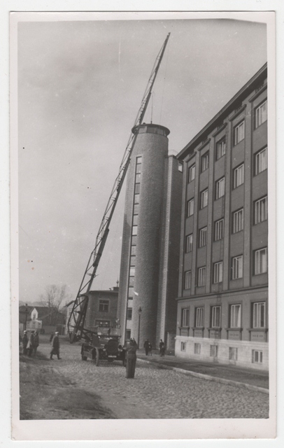 Autoredel Raua Street fire extinguishing building in the background of the tower in 1940s.