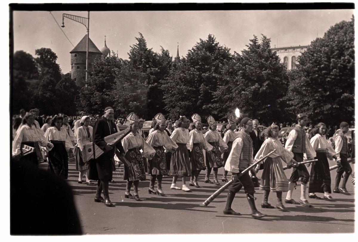 1950 singing festival, folk dancers and folk ball players.