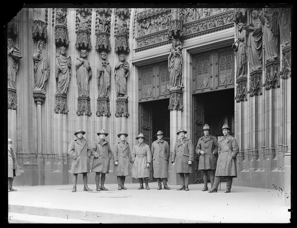 New Zealand soldiers standing on the steps of Cologne Cathedral, Germany