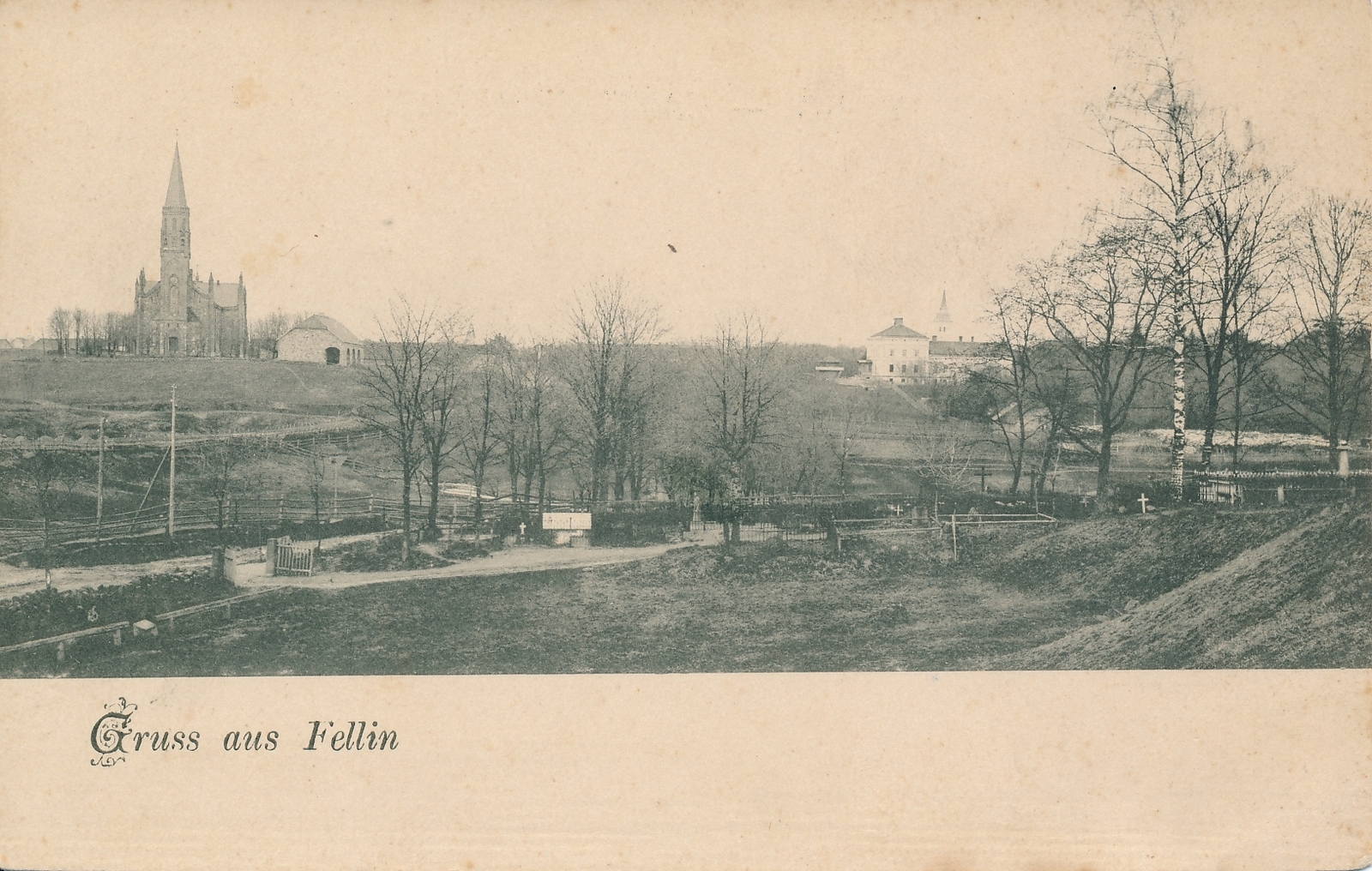 trükipostkaart Viljandi Vana kalmistu, taga vasakul Pauluse kirik, paremal mõisa peahoone u 1910