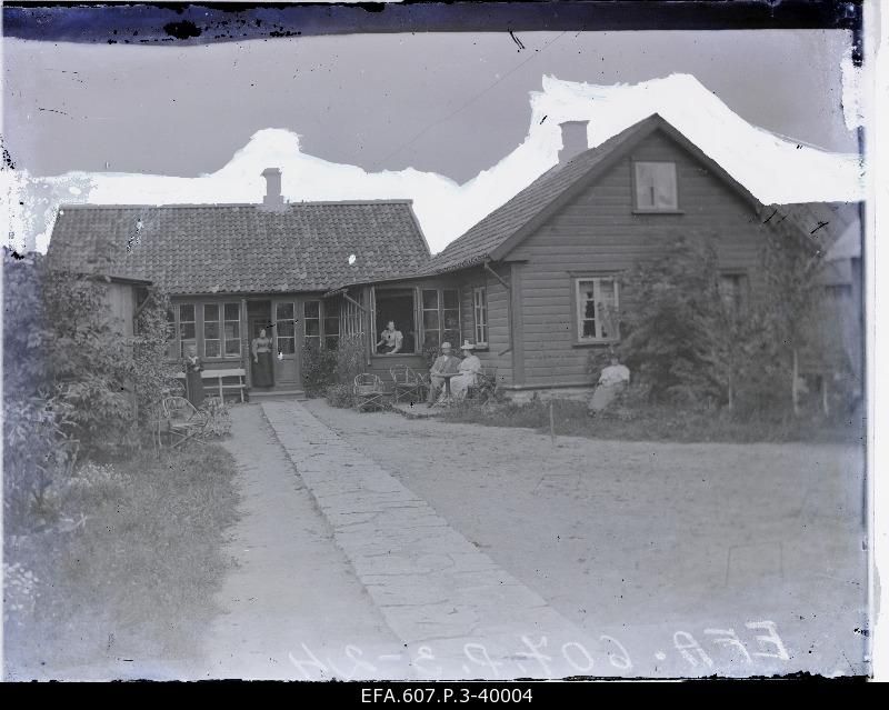 Residents on the windows of the residential building and in the backyard.