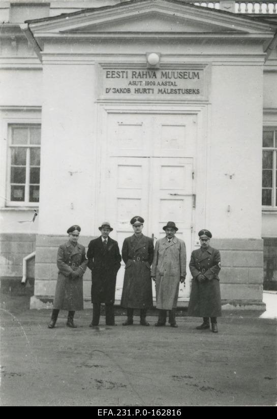 German occupation in Estonia. Co-workers of the Minister of State of the Occupied Eastern Regions Alfred Rosenberg are special scientists in front of the Estonian National Museum. From the left: Dr. Strobel from Berlin, Laid, Dr. Haiding from Berlin, Professor Spiess from Vienna, Professor from Haberlandt from Vienna.