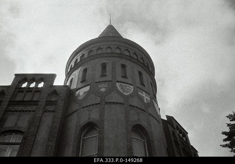 During the restoration of the building of Estonian Country Bank, Estonian municipalities were made in mosaique engineering, which appeared under the red layer of colour.