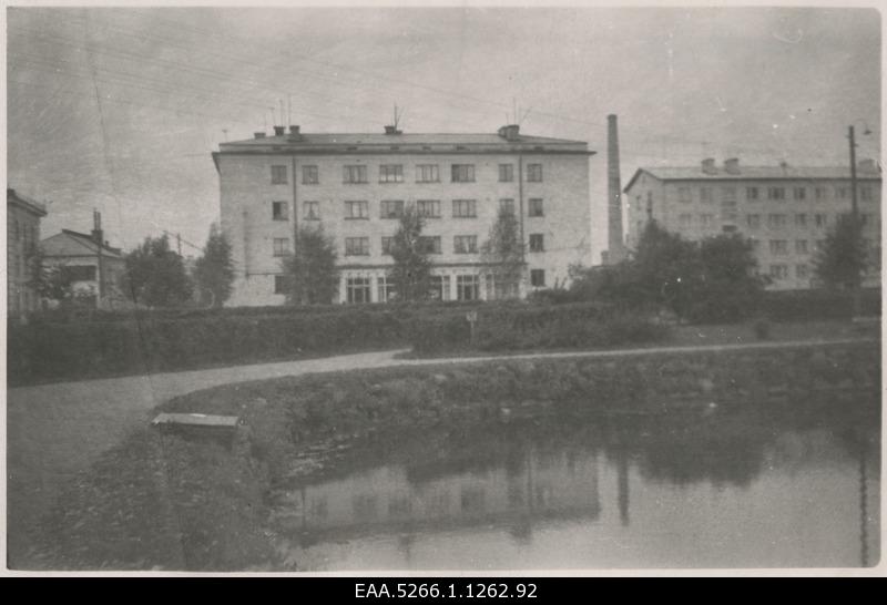 Tiiginurk Theatre "Vanemuise" in the park next to a small house, in the back of Tiigi Street new houses