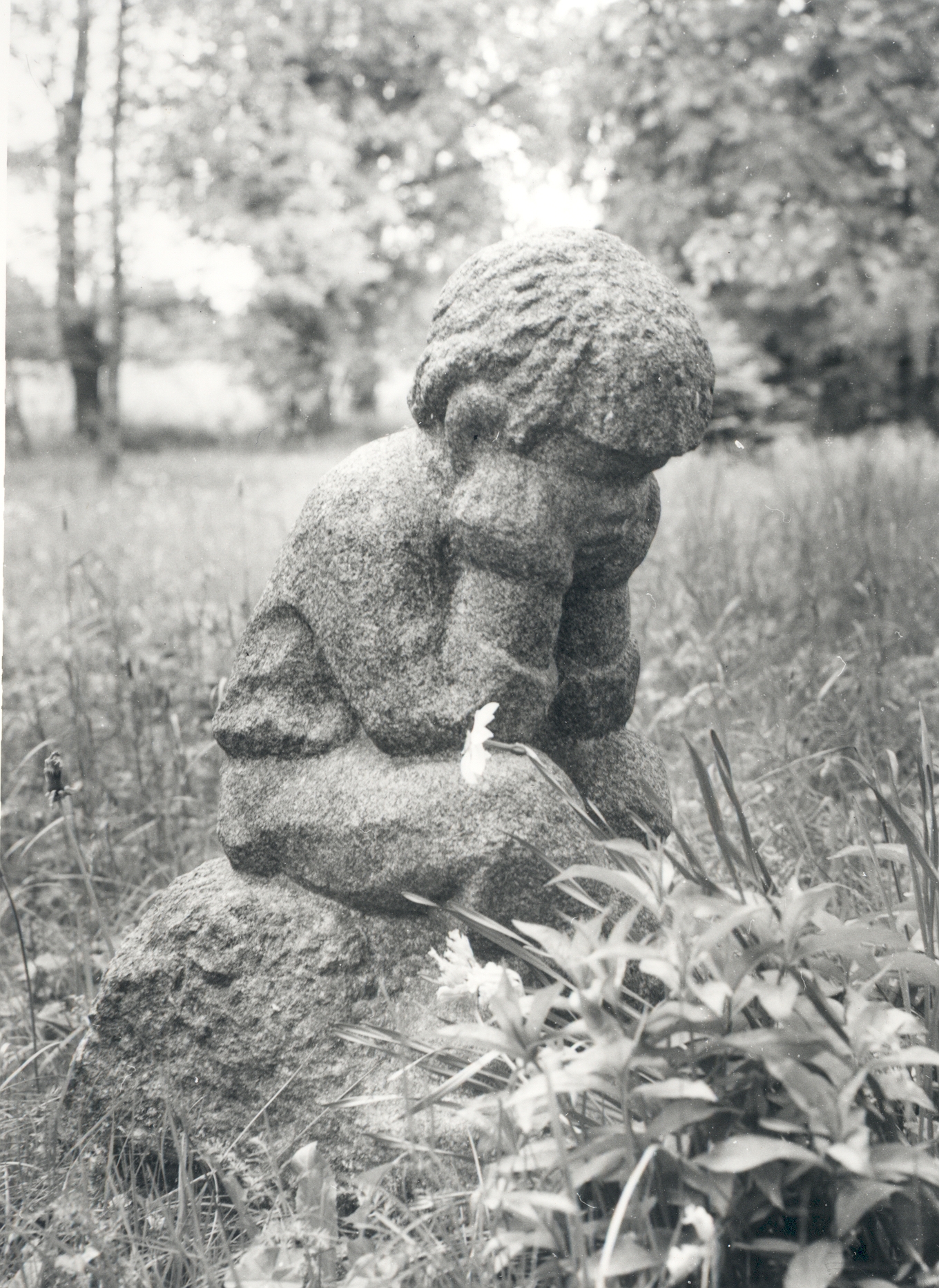 From km employees' expedition 1986. a. Small Illimari sculpture in Uderna School Park
