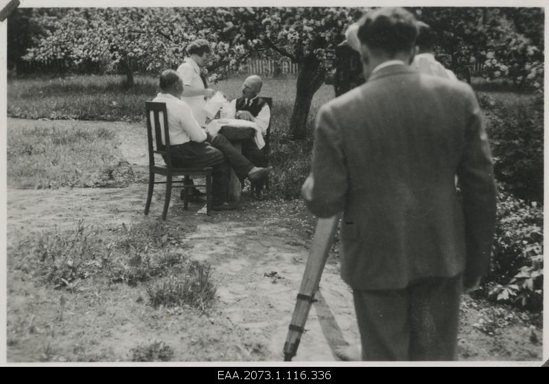 Estonian Cultural Film Circuit Shows at Palamus 23.05.1937, Oskar Luts and his boss Martin Jobson drank milk at the courtyard of his birthplace, Konstantin Kalamees and Arno Raag filming them at the forefront