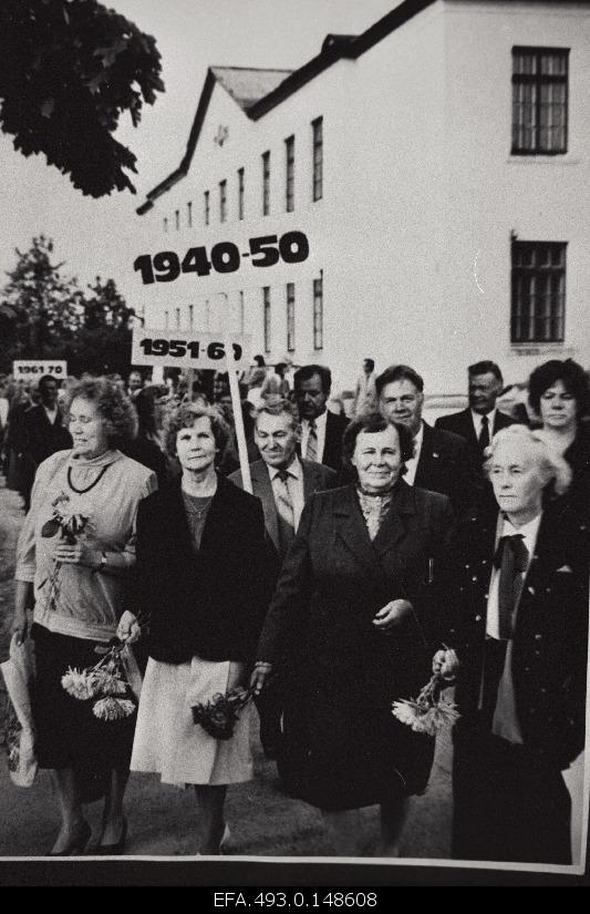 To celebrate the 50th anniversary of the Turba High School participants in front of the school building.