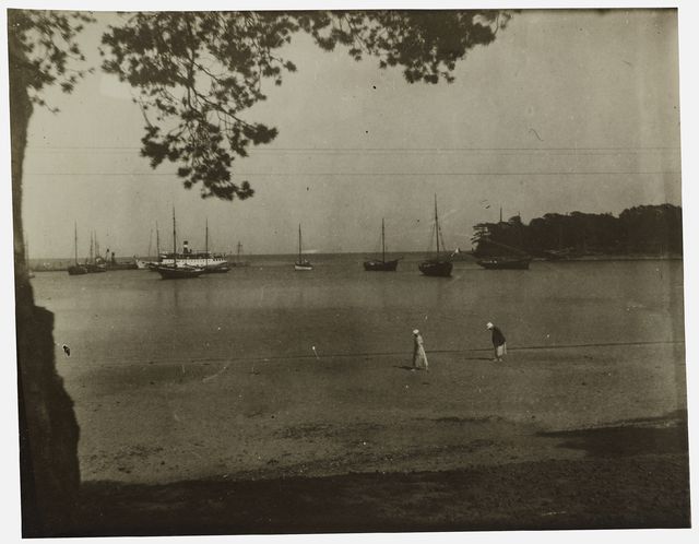 Suursaari, women on the sandy beach and ships on the background - scale, black and white, photo area 8 x 11 cm