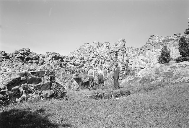 Tourists on the ruins of the Sixth Bishop