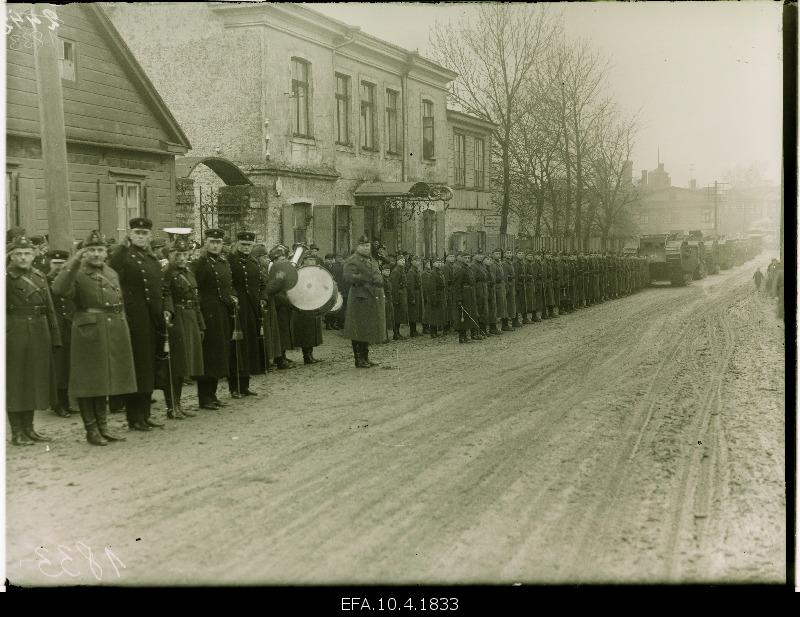 Tanks and embroidery cars on parade.