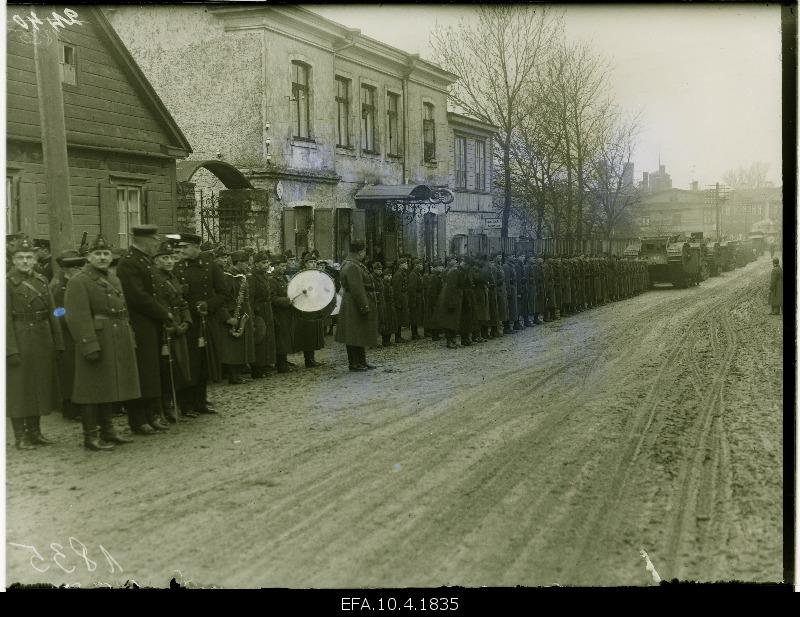 Tanks and embroidery cars on parade.