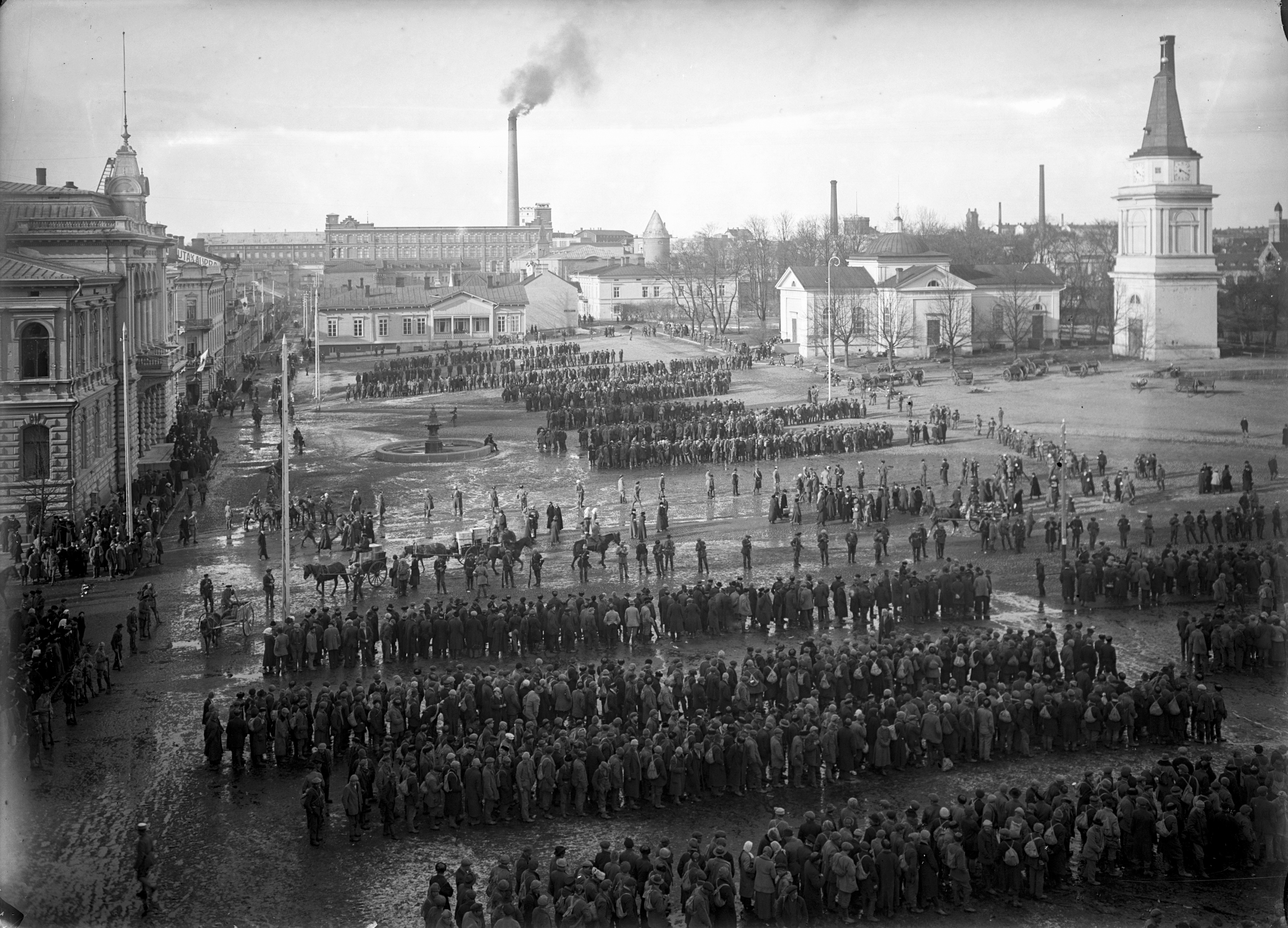 Red prisoners at Tampere Centre 6.4.1918 (26901646771) - CC-BY Tampere 1918, photographer e. a. Bergius, Vapriiki's image archive. Finnish Civil War 1918, Photographer e. a. Bergius, Vapriikki Photo Archives.