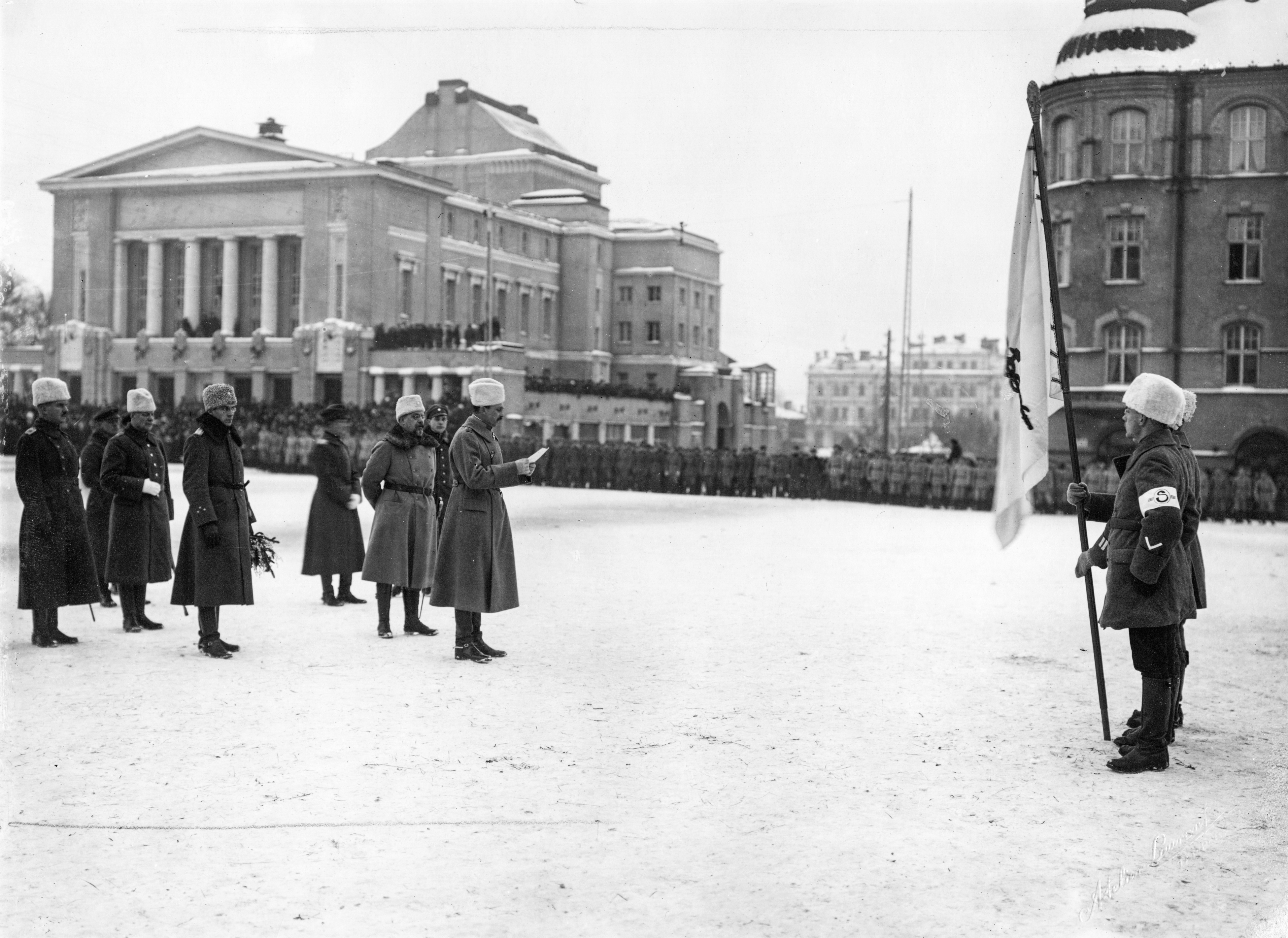 General Mannerheim speaks in the memorial of the beginning of the War of Freedom in Tampere on 30 January 1919 (26901633001) - General Mannerheim speaks in the memorial of the beginning of the War of Freedom in Tampere on 30 January 1919. The location is Keskustori. Behind Mannerheim, Chief of General Staff Hannes Ignatius.