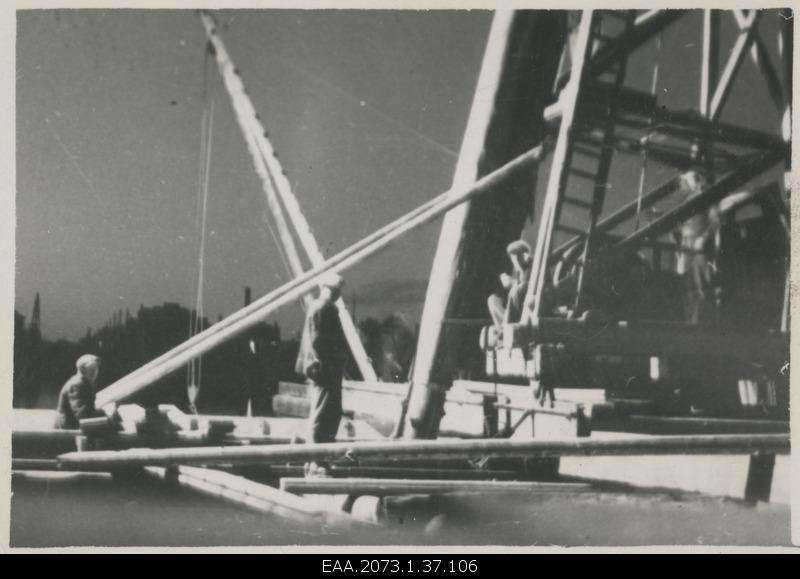 Construction of Pärnu Suursilla, P1 posts on the right shore at night in the light of the projector