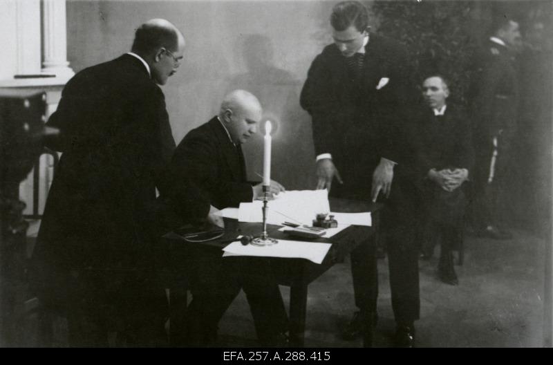 Take peace. Member of the Embassy of the Republic of Estonia Mait Johannes Püümann signing the Estonian-Soviet Russian Peace Treaty.