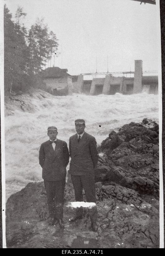 Members of the company Fraternitas Estica at the Imatra hydroelectric power plant at the dam.