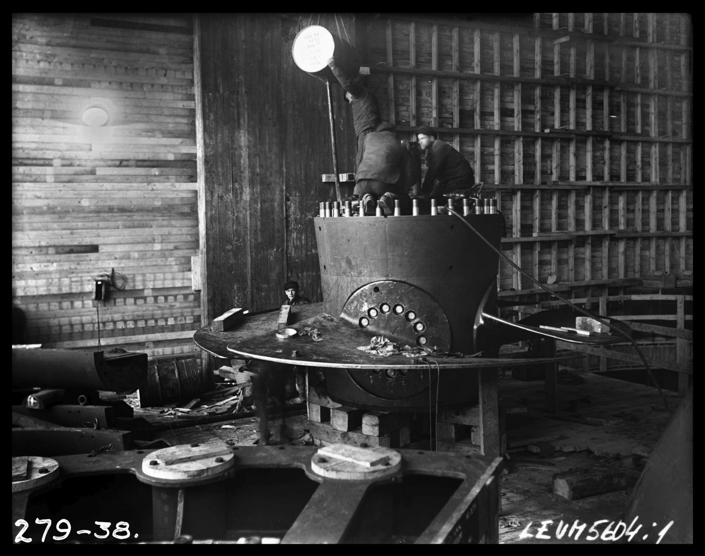 Ķeguma spēkstacijas turbīnas montāža. 1938.gads - From 1936 until 1940, the remarkable Latvian cameraman and photographer E. Kraucs (1898 – 1977) regularly, 1 – 2 times a week, photographically documented the construction of the Kegums power plant.