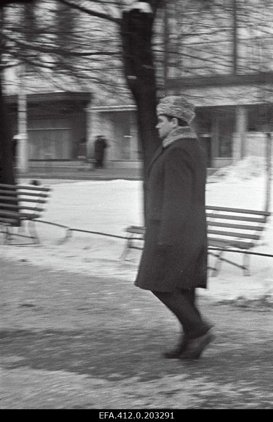 Rat Estonia soloist Soviet Union folk artist Georg Ots walks on the street.