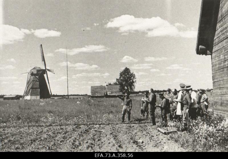 The listeners of the Higher War School at the windmill.