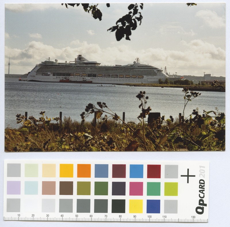 View of the passenger ship "Jewel amongst" in the port. On the left TV Tower.