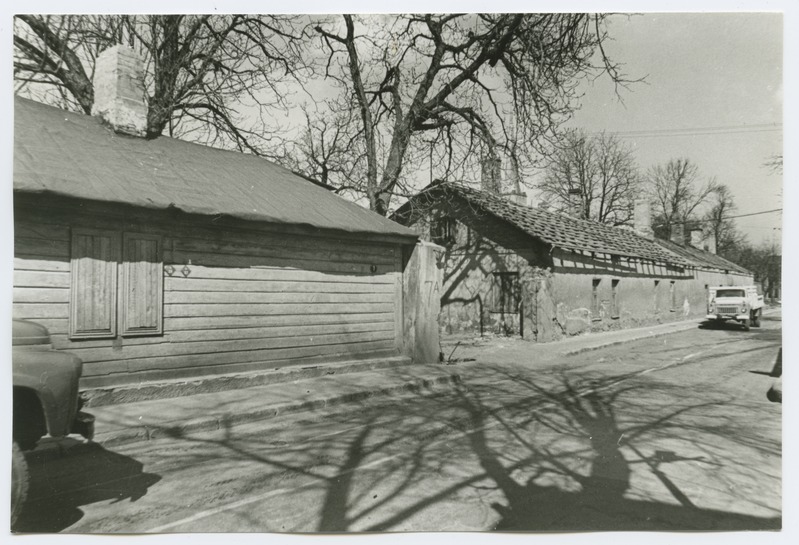 Broken low wooden buildings Ujula Street 7.