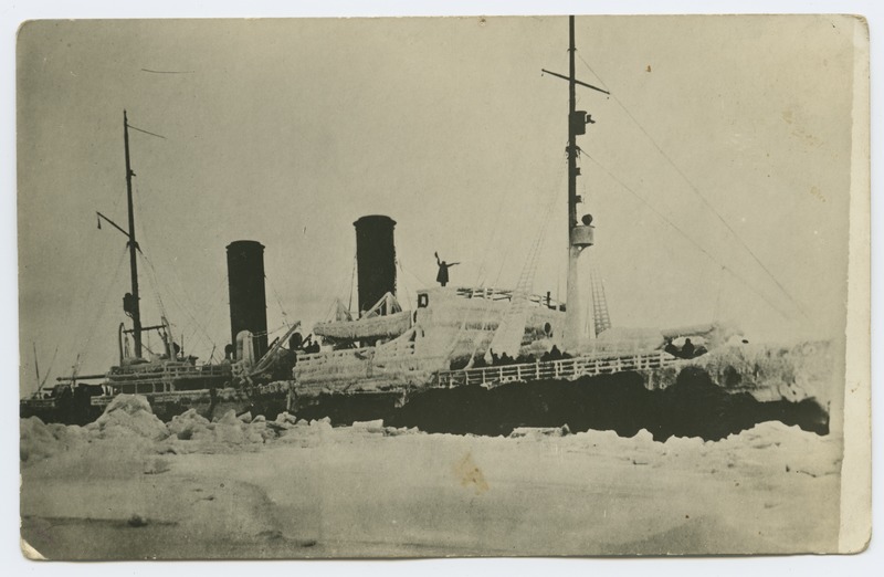 Frozen goods/a passenger ship covered with ice on a trail.