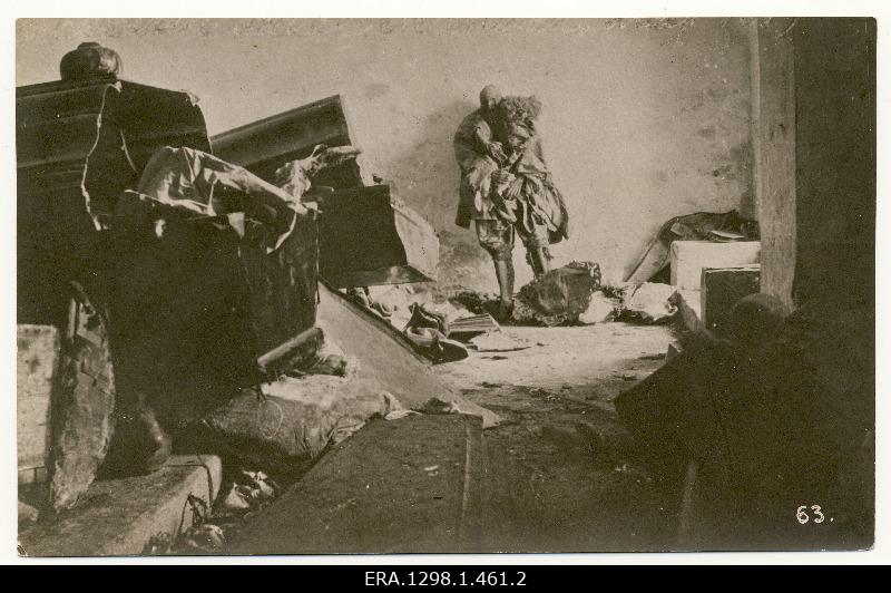 Robbed Jelgava (Miitavi) castle basement. Loose and broken chips on the left, raised body to stand against the wall. Photo postcard no. 63